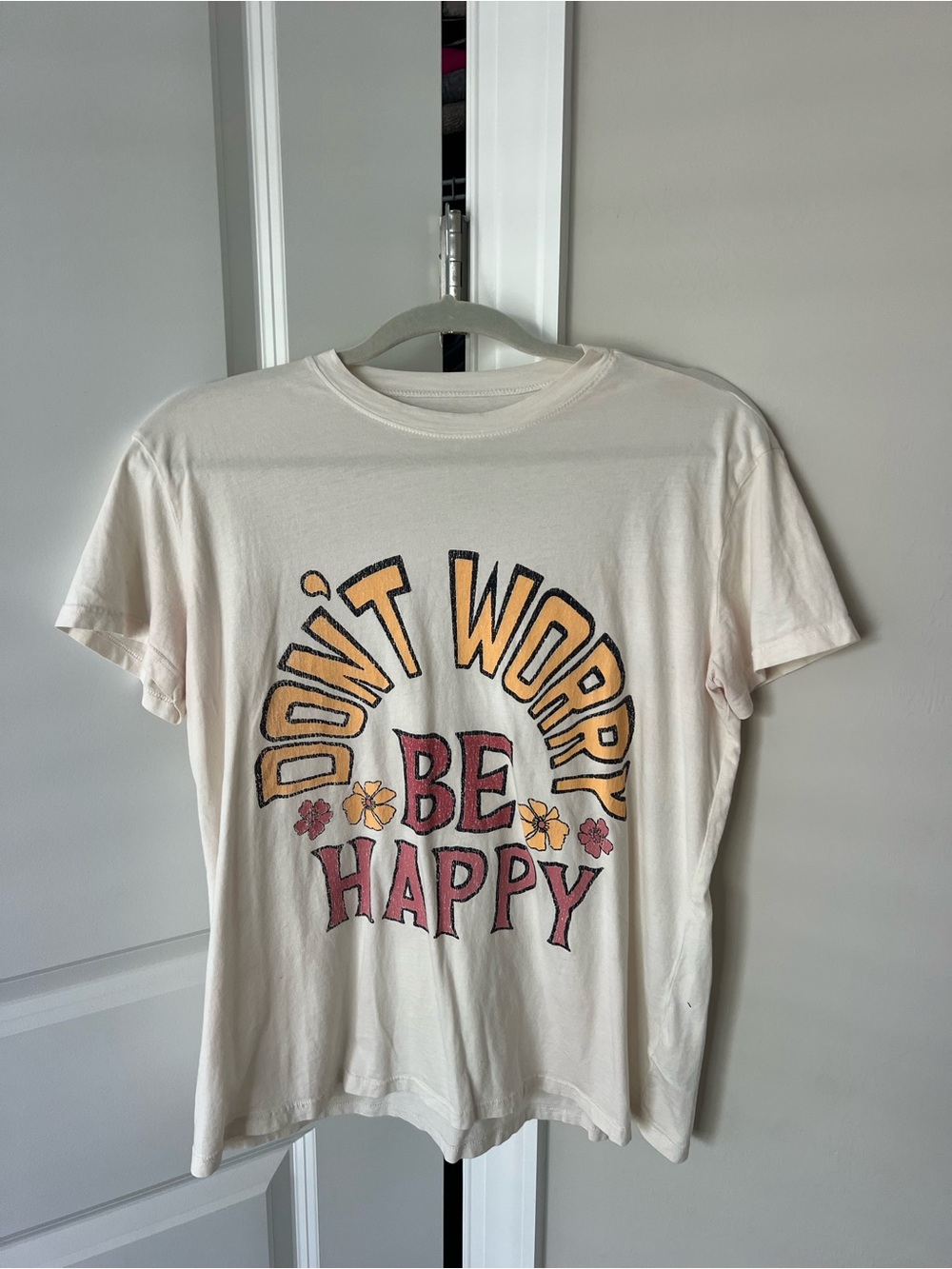 Don't Worry Be Happy Graphic Tee - Cream with Yellow & Pink Print
